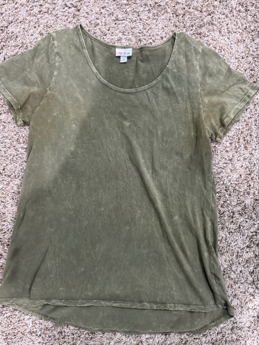 LuLaRoe women's short sleeve shirt in an olive green acid wash style size medium
